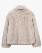 Veste courte en fausse fourrure grise